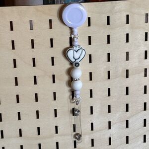 Handcrafted white nurse theme beaded badge reel